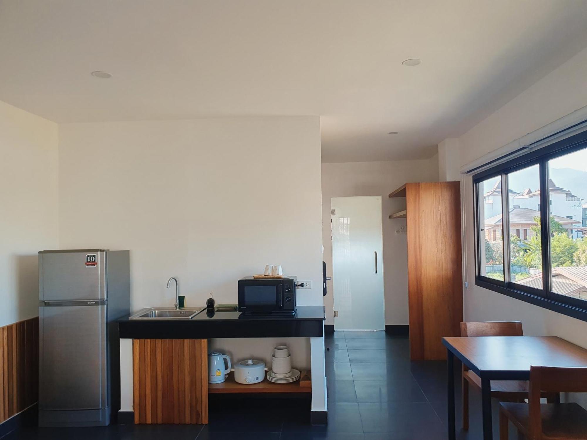 The Sila Suites - Intrawarorot Chiang Mai Exterior photo